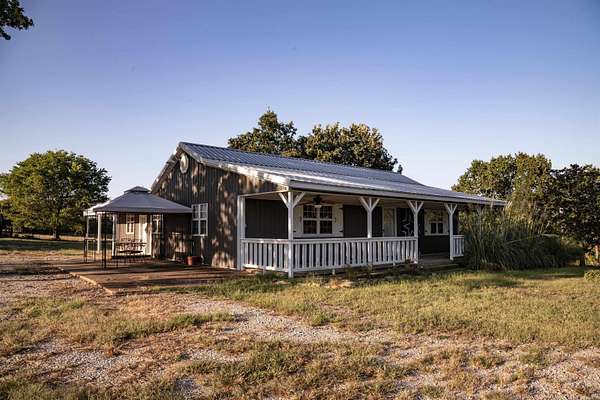 20 Acres of Agricultural Land with Home for Sale in Mammoth Spring, Arkansas