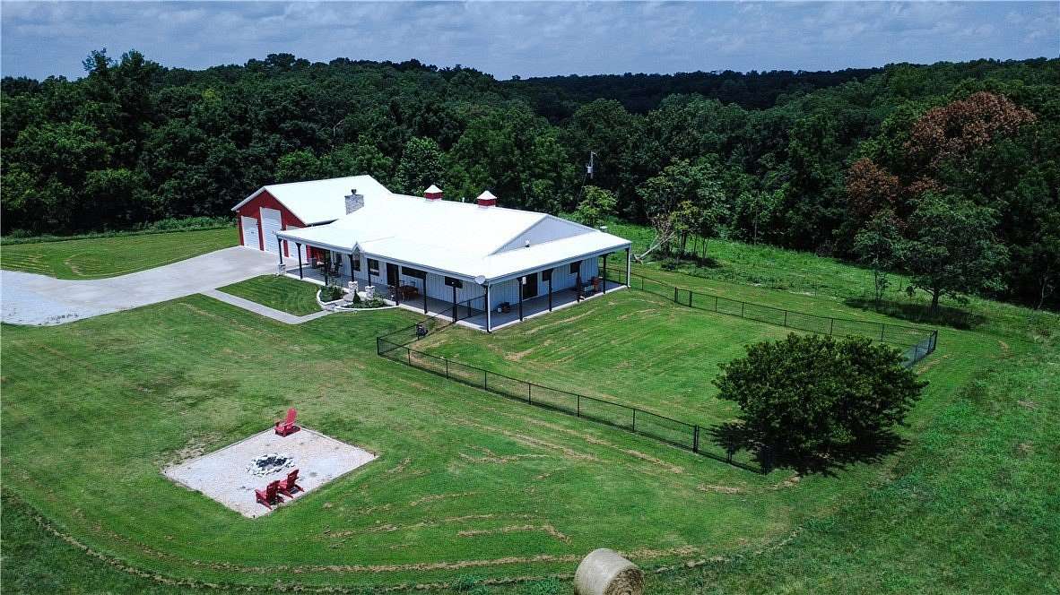 17.8 Acres of Land with Home for Sale in Gravette, Arkansas