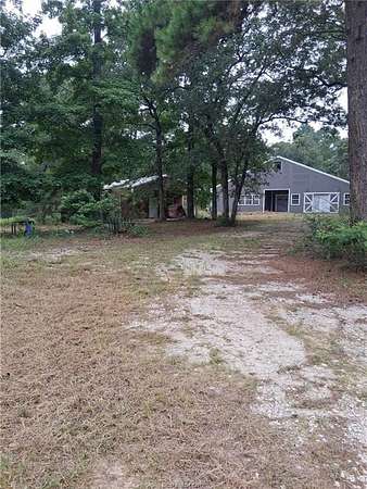 11.9 Acres of Land with Home for Sale in Centerville, Texas