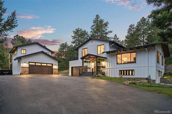 2.56 Acres of Land with Home for Sale in Evergreen, Colorado
