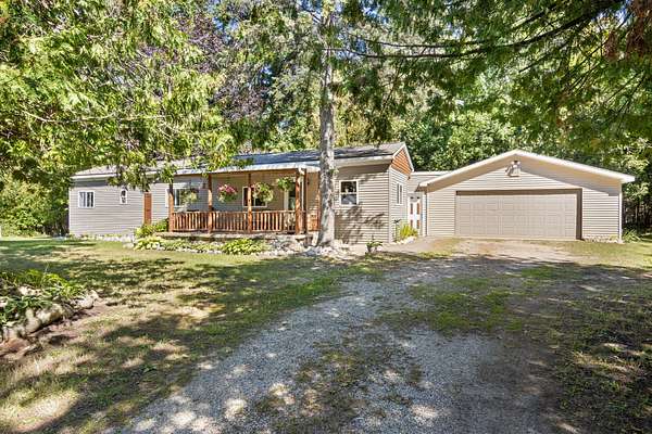 14.4 Acres of Recreational Land with Home for Sale in Charlevoix, Michigan