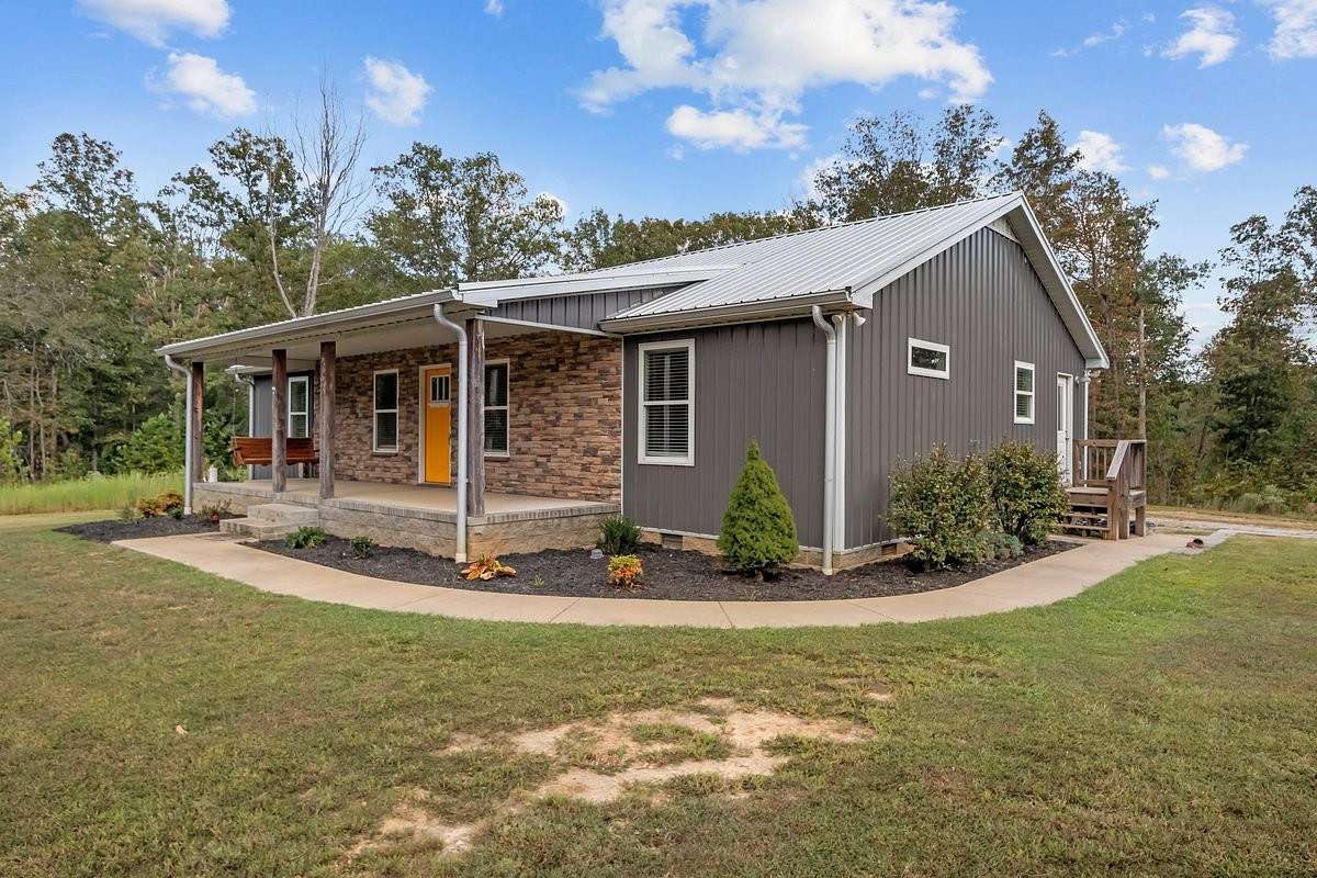 5.54 Acres of Land with Home for Sale in Cumberland Furnace, Tennessee