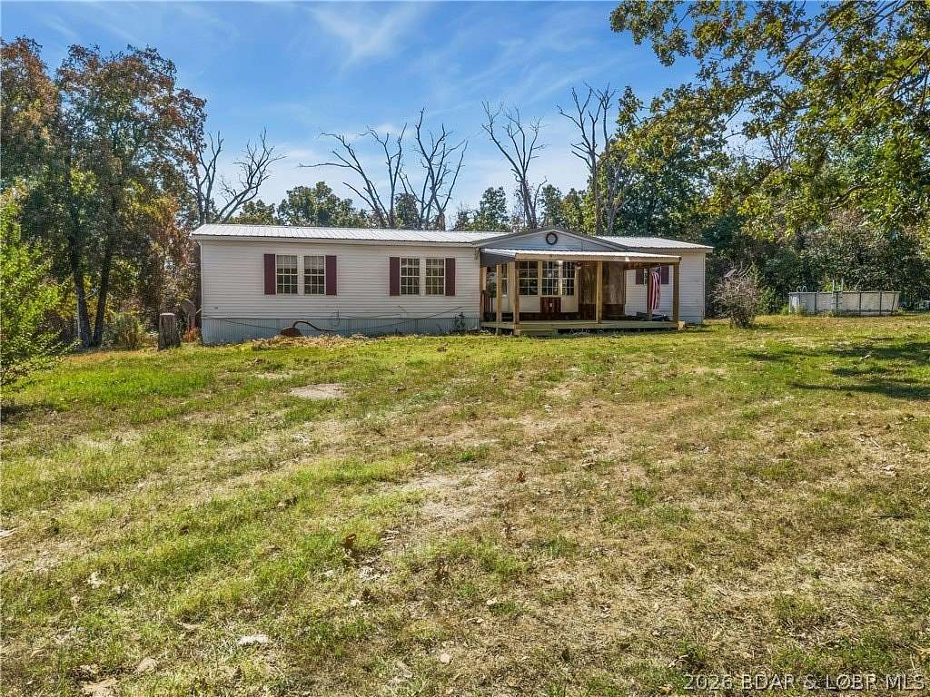 18.7 Acres of Land with Home for Sale in Macks Creek, Missouri