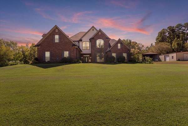 15.3 Acres of Recreational Land with Home for Sale in Gilmer, Texas