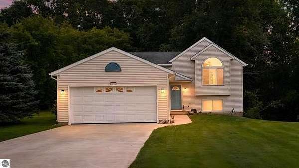 2.37 Acres of Land with Home for Sale in Cedar Springs, Michigan