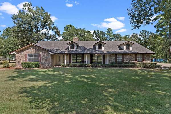 7.49 Acres of Land with Home for Sale in Benton, Louisiana
