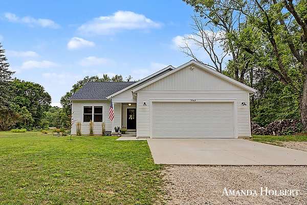 2 Acres of Land with Home for Sale in Cedar Springs, Michigan