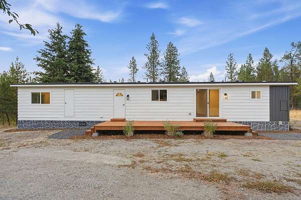4.29 Acres of Land with Home for Sale in Elk, Washington