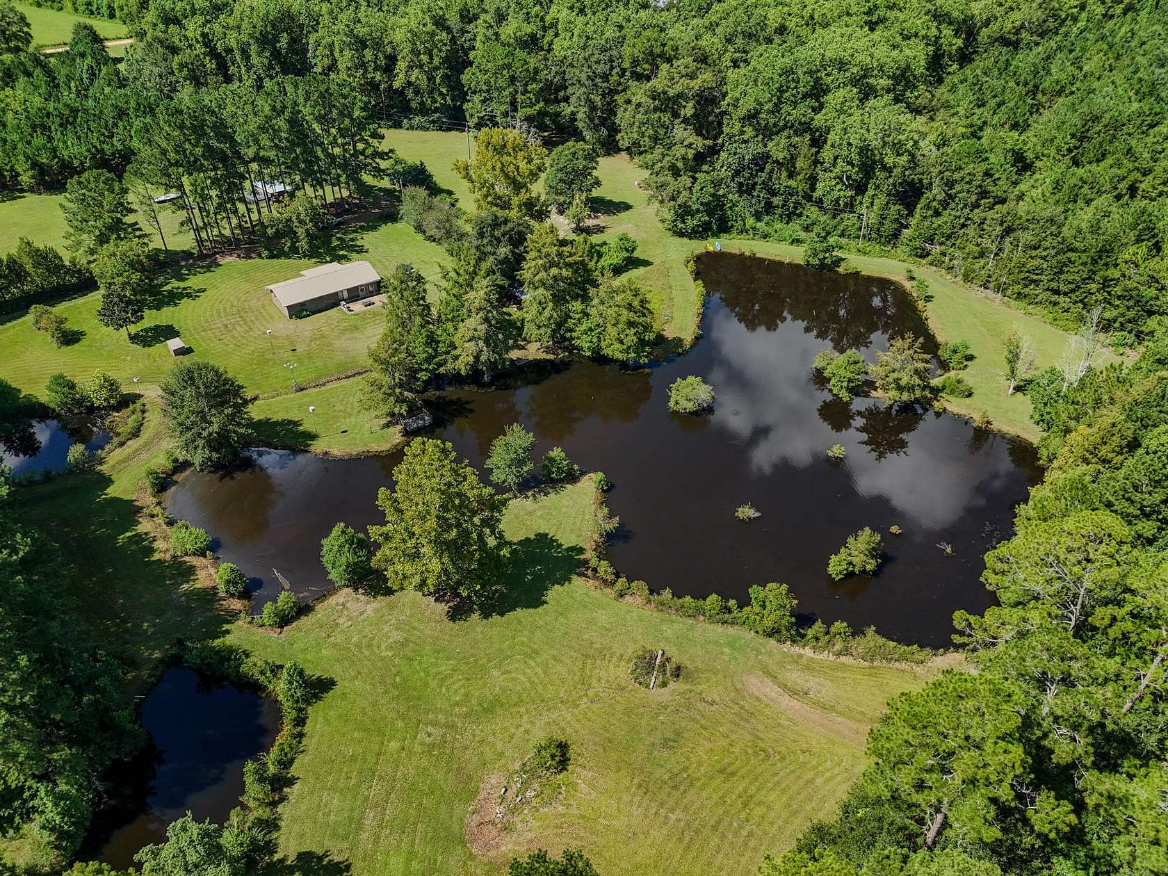 8 Acres of Land with Home for Sale in Opp, Alabama