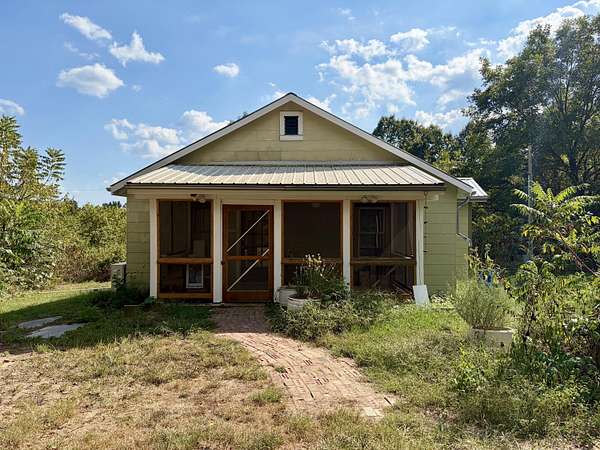 29.2 Acres of Land with Home for Sale in Alton, Missouri