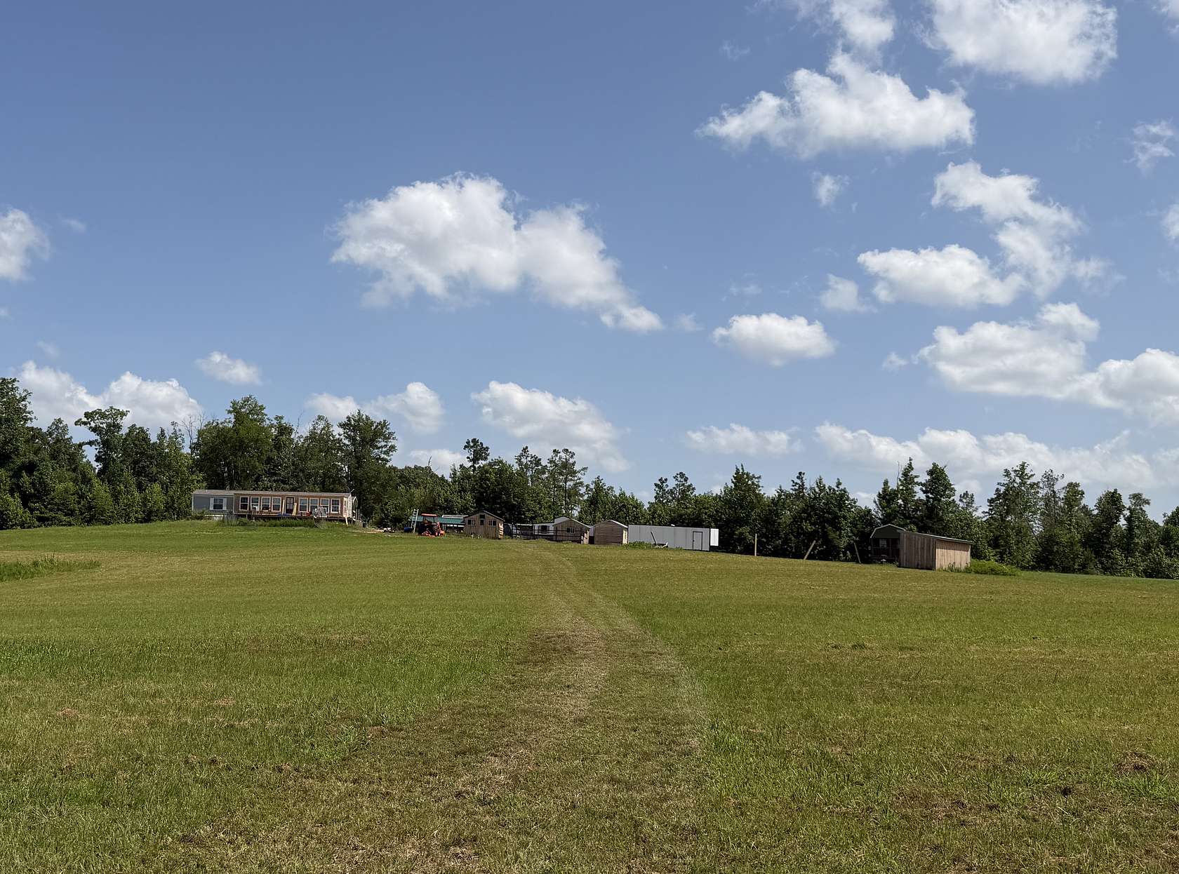 81.7 Acres of Land with Home for Sale in Adamsville, Tennessee