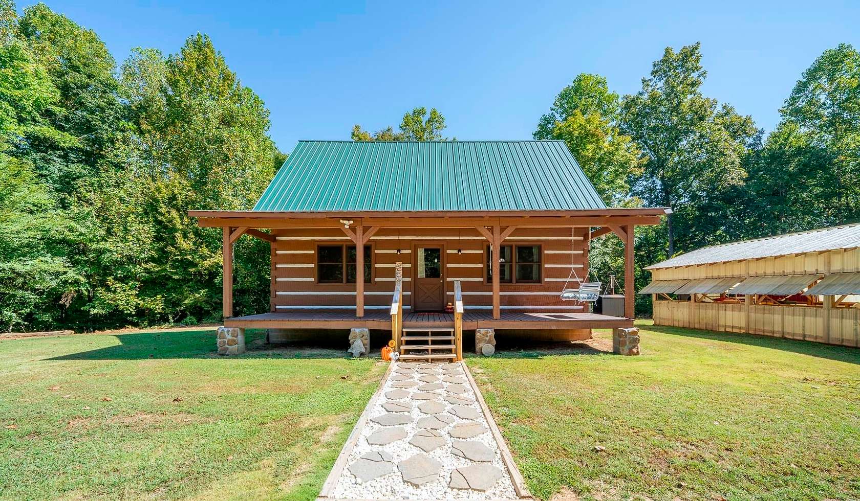 59.7 Acres of Land with Home for Sale in Adamsville, Tennessee