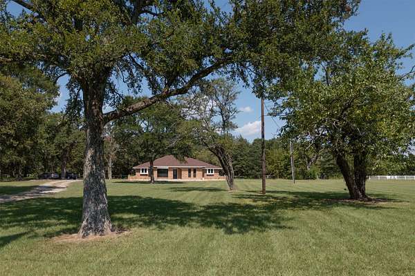 2.69 Acres of Land with Home for Sale in Quinlan, Texas