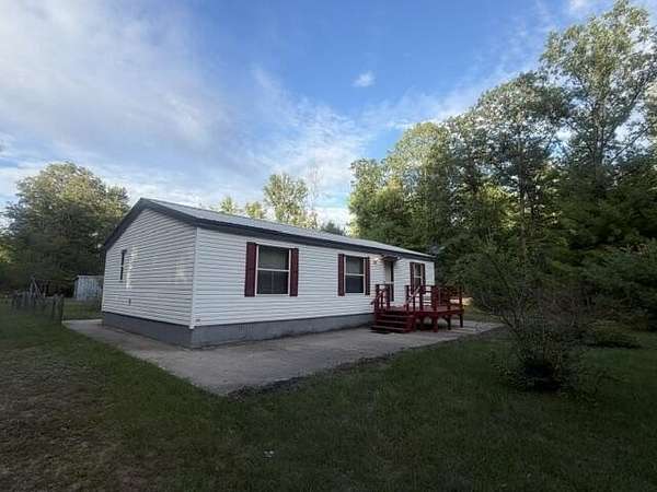 10 Acres of Recreational Land with Home for Sale in White Cloud, Michigan