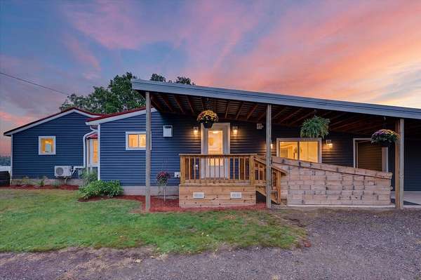 1.57 Acres of Land with Home for Sale in Sand Lake, Michigan