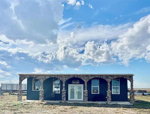 39.4 Acres of Land with Home for Sale in Strasburg, Colorado