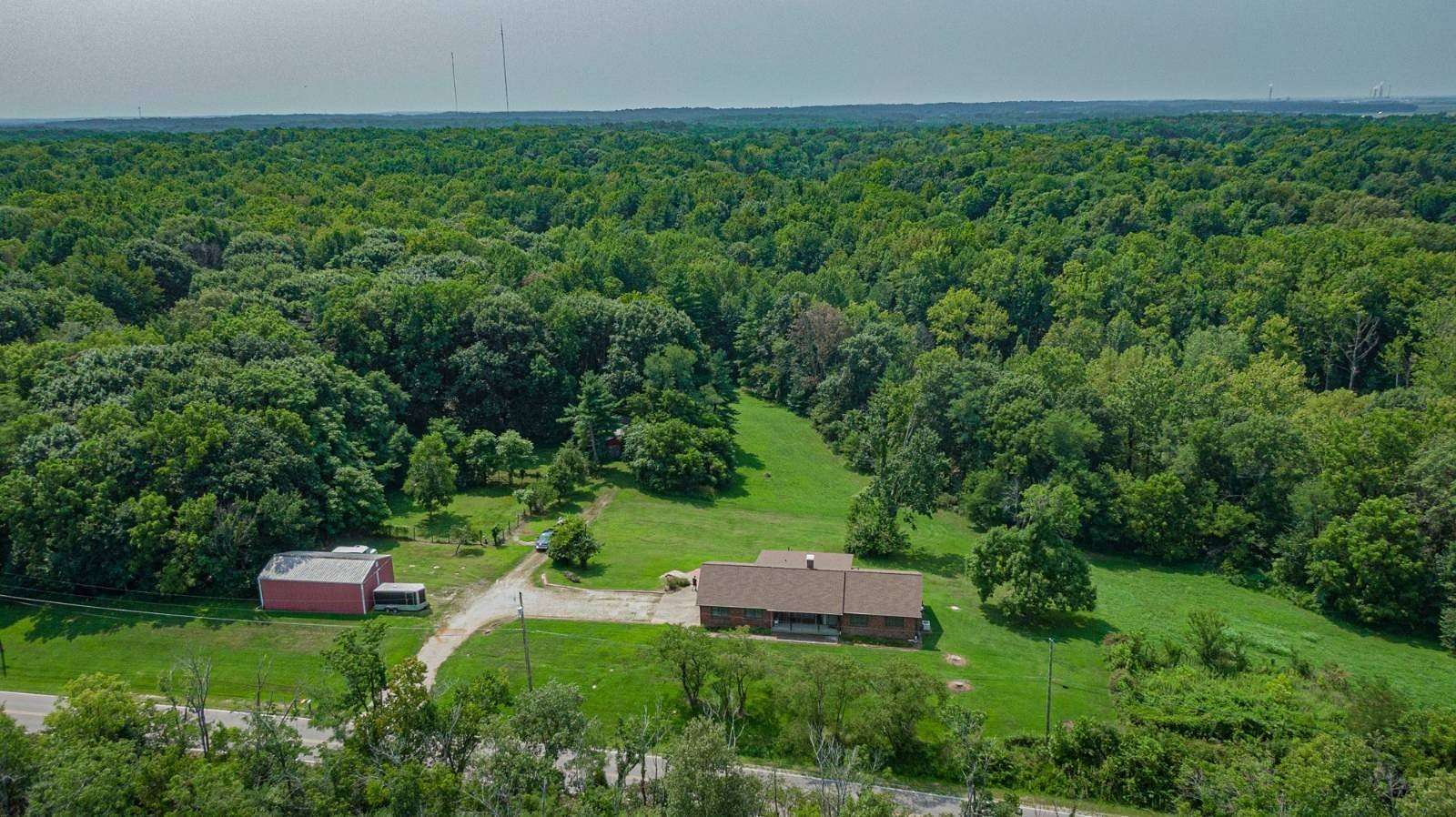 19.8 Acres of Recreational Land with Home for Auction in Boonville, Indiana