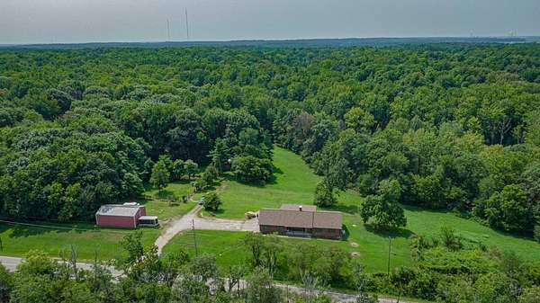 19.8 Acres of Recreational Land with Home for Auction in Boonville, Indiana