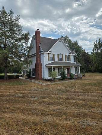 5 Acres of Land with Home for Sale in Harrah, Oklahoma