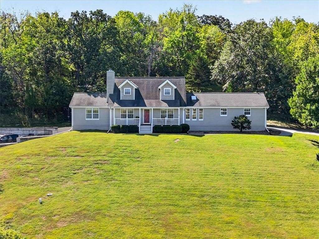 6.5 Acres of Land with Home for Sale in Lone Jack, Missouri