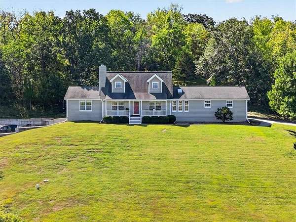 6.5 Acres of Land with Home for Sale in Lone Jack, Missouri