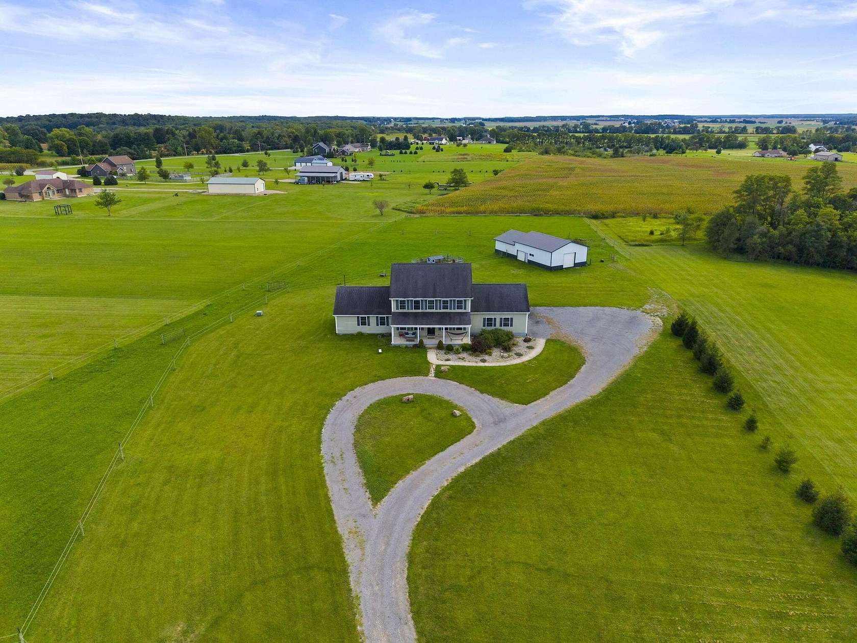 5.2 Acres of Land with Home for Sale in West Liberty, Ohio