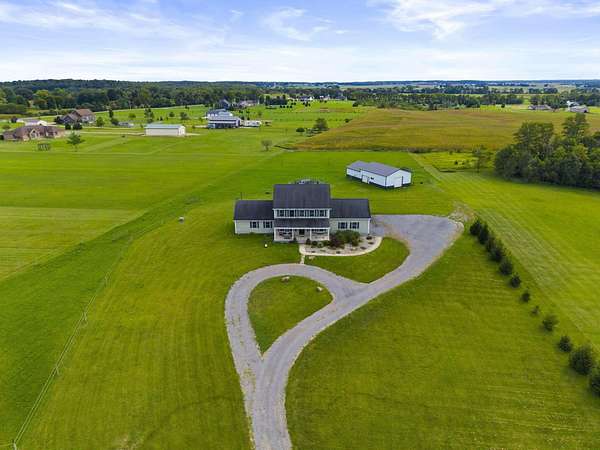5.2 Acres of Land with Home for Sale in West Liberty, Ohio