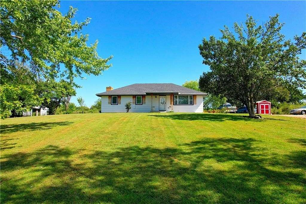 8 Acres of Land with Home for Sale in Excelsior Springs, Missouri