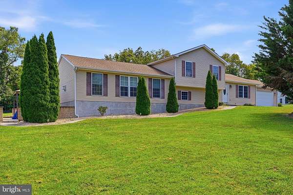 1.5 Acres of Land with Home for Sale in Falling Waters, West Virginia
