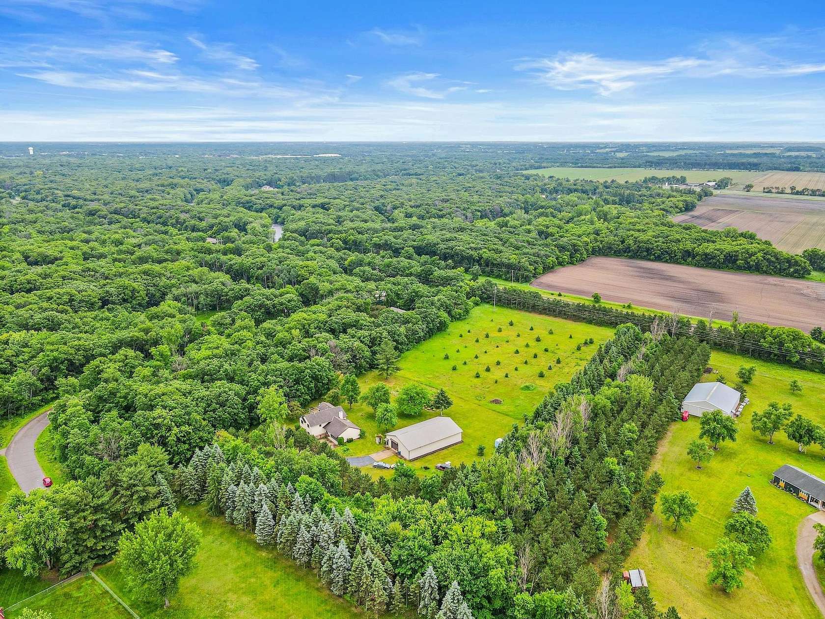 6.33 Acres of Land with Home for Sale in Elk River, Minnesota