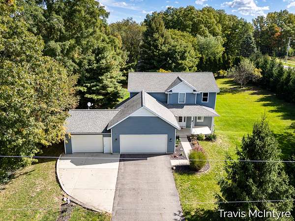 2 Acres of Land with Home for Sale in Rockford, Michigan