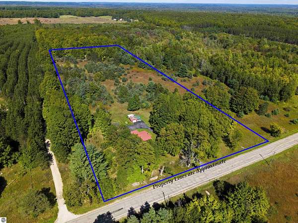 13.5 Acres of Recreational Land with Home for Sale in Fife Lake, Michigan