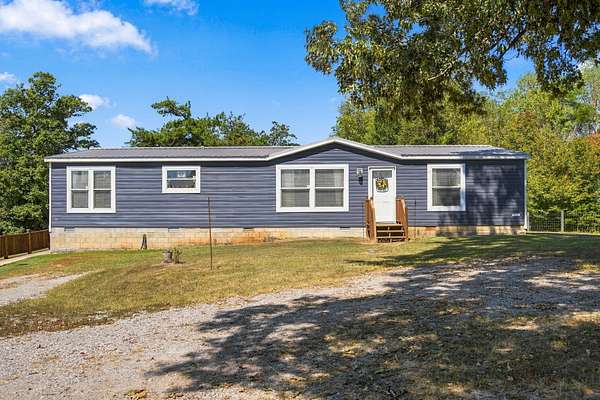 1.9 Acres of Land with Home for Sale in Quebeck, Tennessee