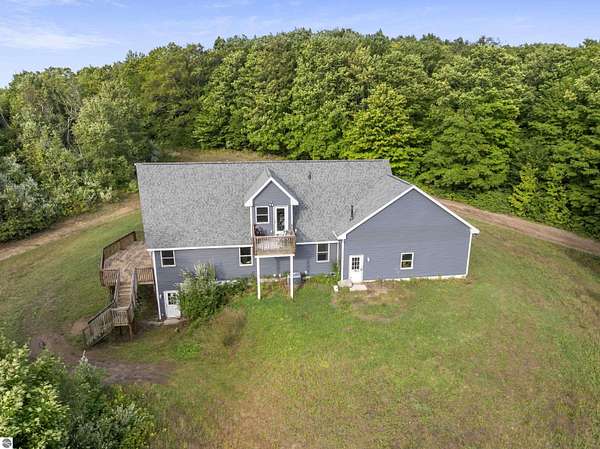 11 Acres of Land with Home for Sale in Benzonia, Michigan