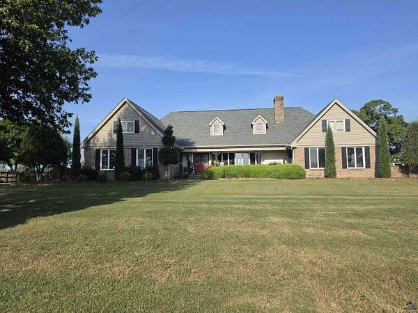 7.4 Acres of Land with Home for Sale in Arabi, Georgia
