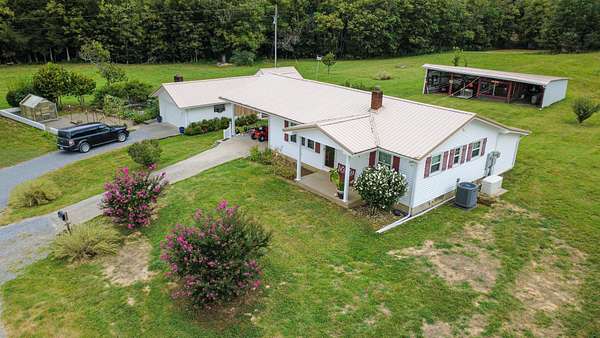 15.6 Acres of Land with Home for Sale in Jamestown, Kentucky