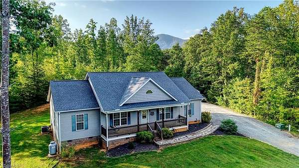 5 Acres of Land with Home for Sale in Lowgap, North Carolina