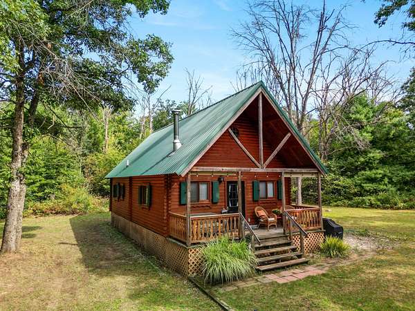 10 Acres of Recreational Land with Home for Sale in White Cloud, Michigan