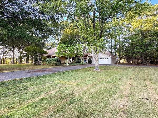 1.53 Acres of Land with Home for Sale in Covington, Tennessee