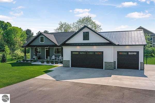 10.3 Acres of Land with Home for Sale in Cedar, Michigan