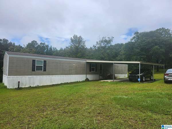 2.48 Acres of Land with Home for Sale in Eight Mile, Alabama