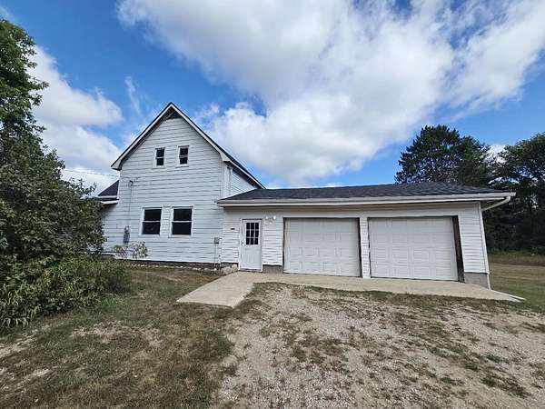 20 Acres of Land with Home for Sale in Tustin, Michigan