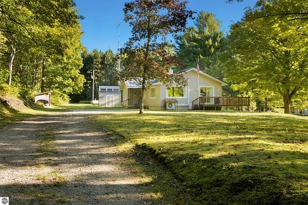 6 Acres of Land with Home for Sale in Interlochen, Michigan