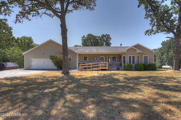 4.83 Acres of Land with Home for Sale in Joplin, Missouri