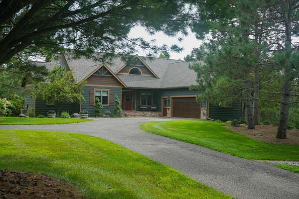 5.7 Acres of Land with Home for Sale in Breezy Point, Minnesota