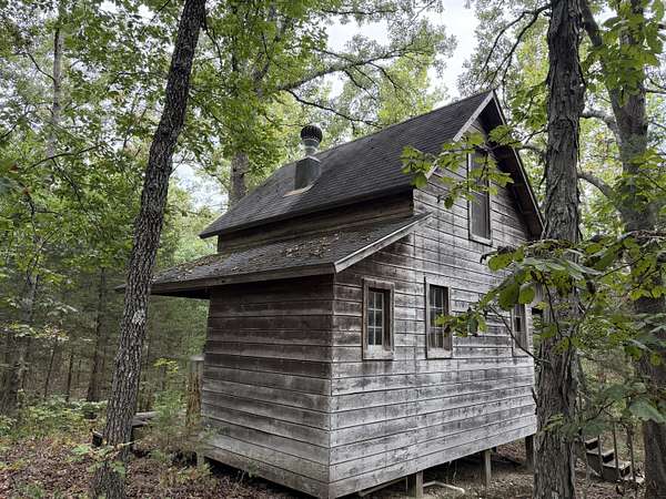 81.2 Acres of Recreational Land with Home for Sale in Urbana, Missouri