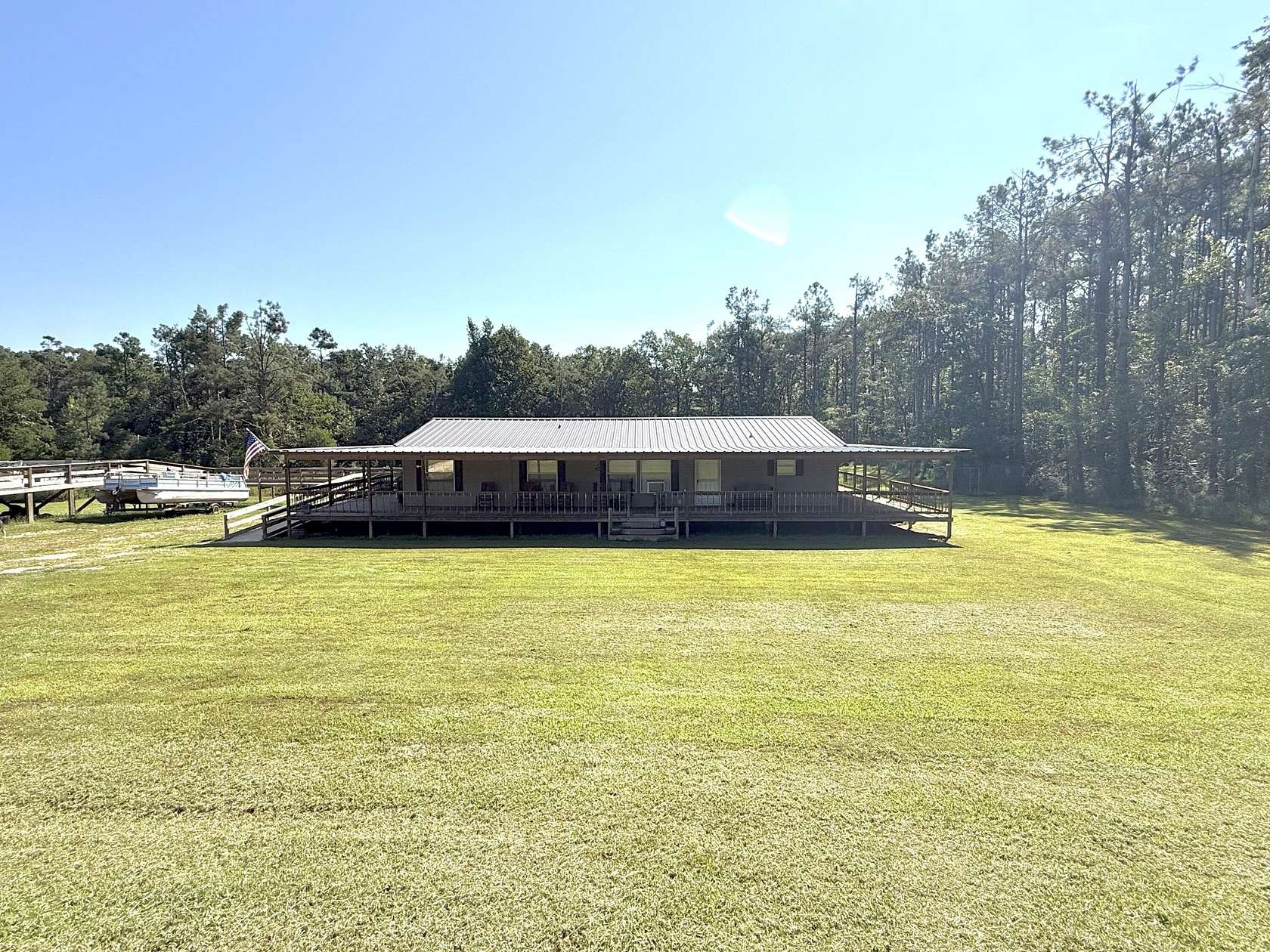 10.6 Acres of Recreational Land with Home for Sale in Savannah, Tennessee