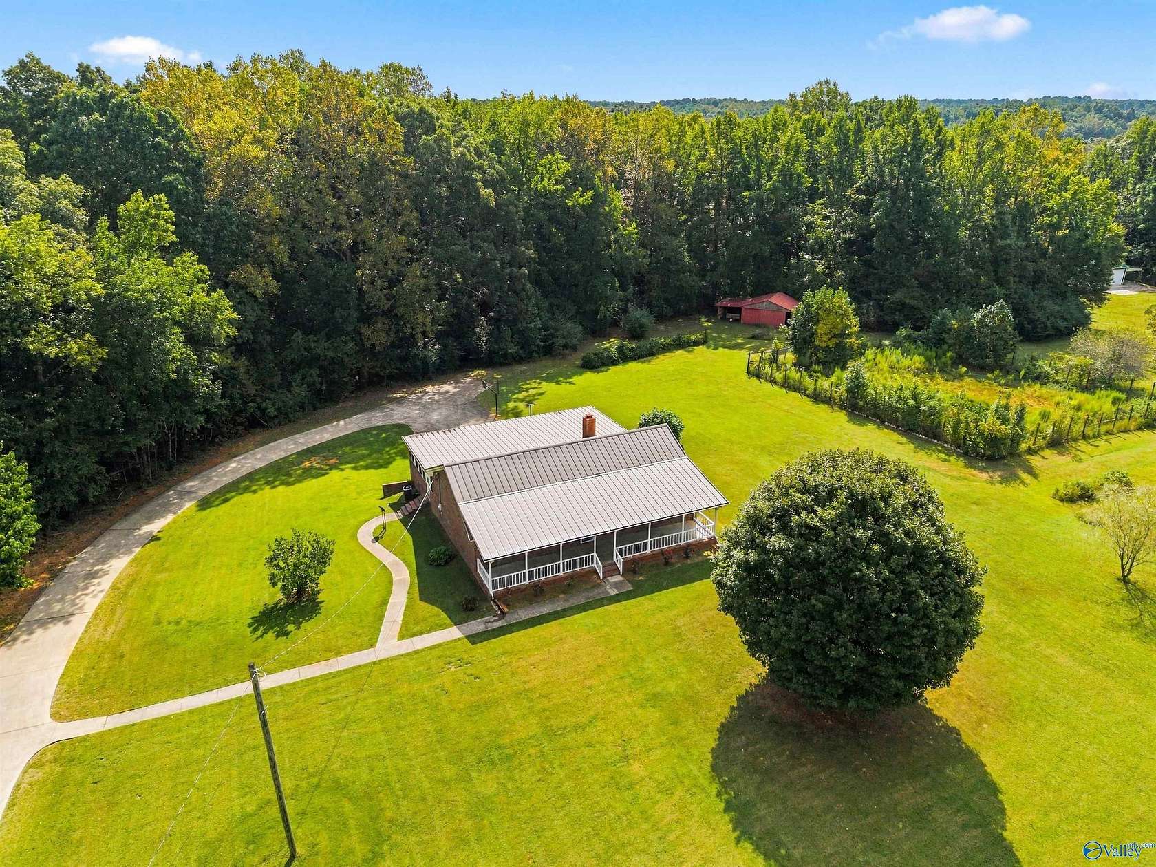7.1 Acres of Land with Home for Sale in Rogersville, Alabama