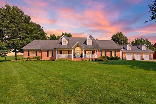 10.9 Acres of Land with Home for Sale in Stamping Ground, Kentucky