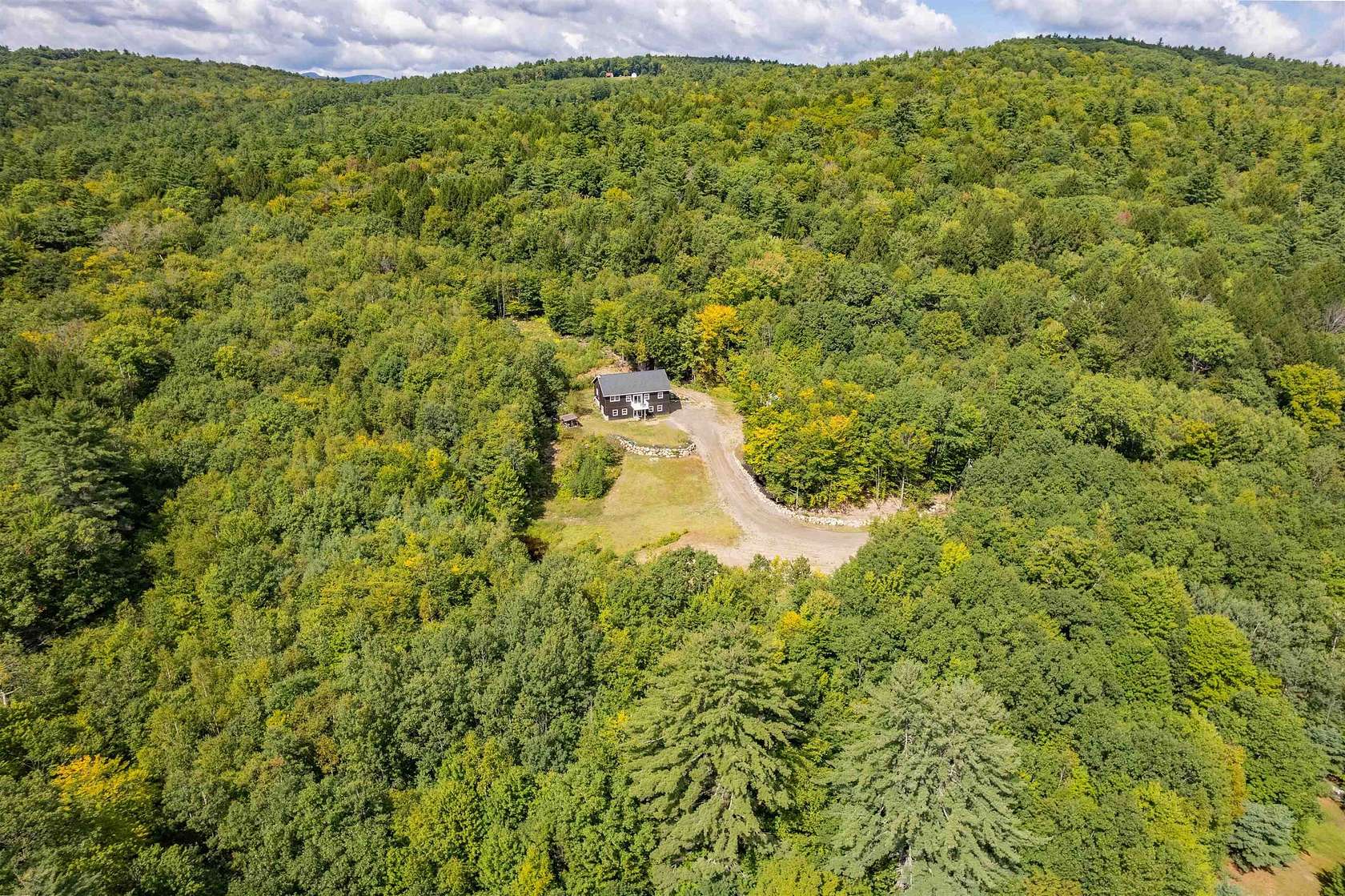 8 Acres of Land with Home for Sale in Bristol, New Hampshire